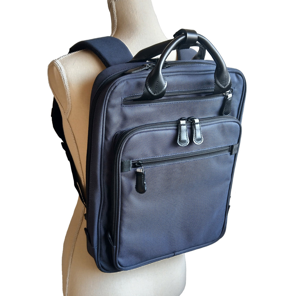 【訳アリ品】海外製／PC対応／自転車対応／A4対応／薄型／スリム型／２WAY／リュック／手提げ／ハンドル付／ネイビー／紺色／126029